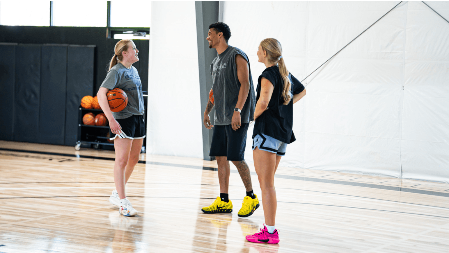 Coach mentoring athletes during a training session