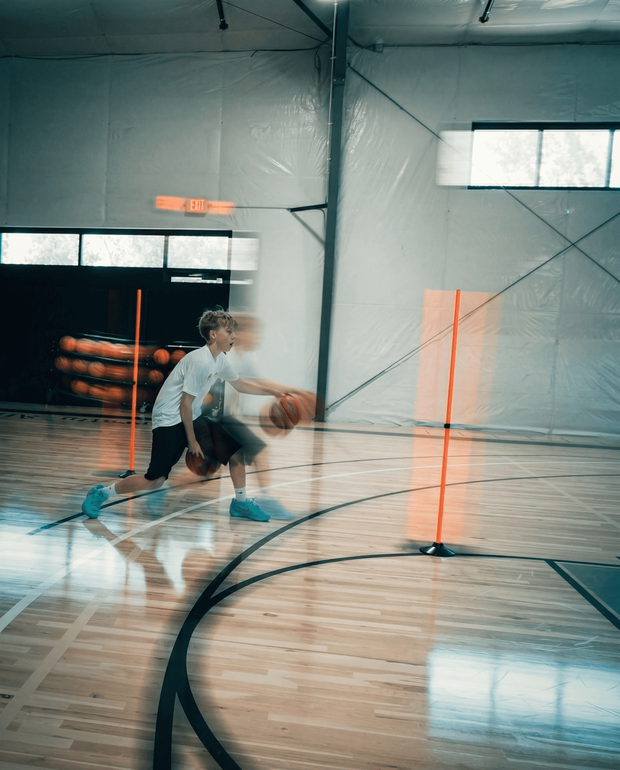 Athlete completing basketball movement and skill training
